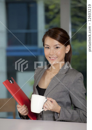Asian businesswoman taking a break 12603219