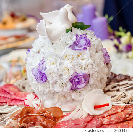 Beautiful bouquet and various delicious meat appetizers Beautiful bouquet and various delicious meat appetizers 12603434