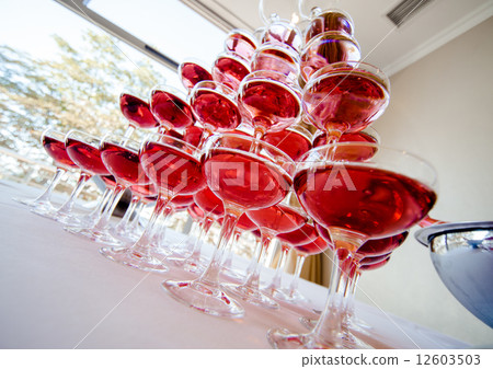 Pyramid of pink champagne Pyramid of pink champagne 12603503