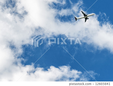 Airplane over cloudy sky background Airplane over cloudy sky background 12603841