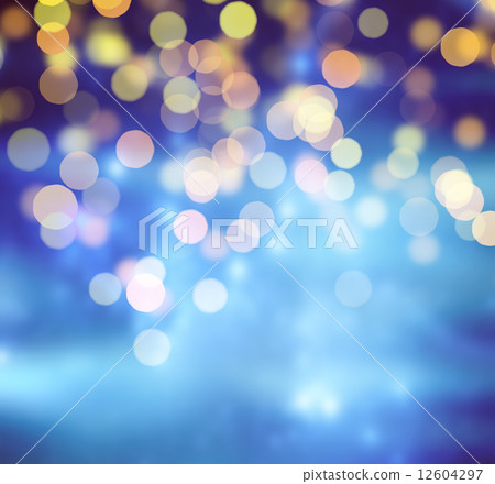 Blue Festive Christmas background. Abstract background with bokeh defocused lights and stars Blue Festive Christmas background. Abstract background with bokeh defocused lights and stars 12604297