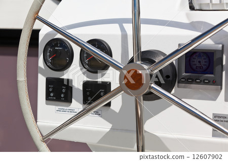 Sailing yacht control wheel and implement. 12607902