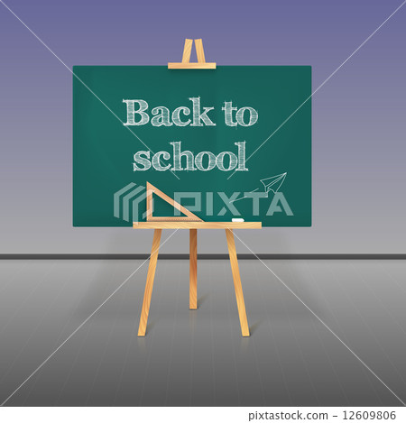 Green school board with chalk on a tripod 12609806