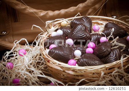 home made chocolates in metal basket with purse 12610251