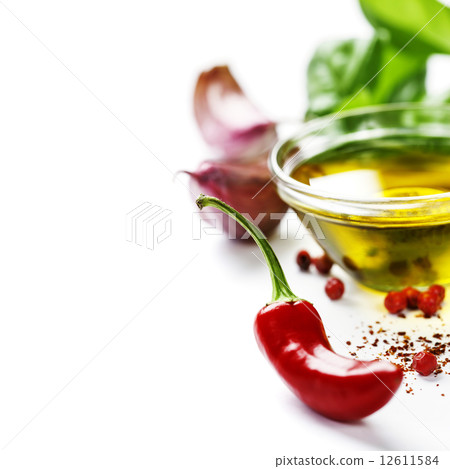chili peppers with herbs and spices 12611584