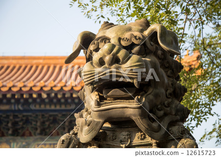 Bronze Guardian Lion Statue in Yonghe Temple (Lama Temple) in Beijing, China 12615723