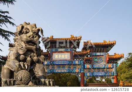 Bronze Guardian Lion Statue in Yonghe Temple (Lama Temple) in Beijing, China 12615728