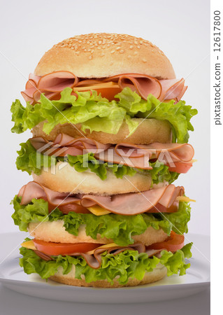 Fast food big sandwich  on plate 12617800
