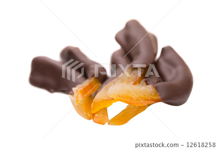Orange slices in dark chocolate, close-up Orange slices in dark chocolate, close-up 12618258