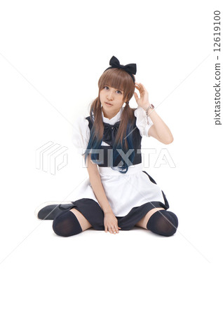 A cute woman in a maid dress A cute woman in a maid dress 12619100