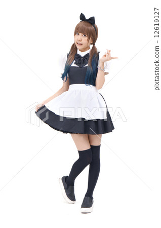 A cute woman in a maid dress 12619127