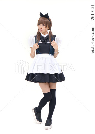 A cute woman in a maid dress A cute woman in a maid dress 12619131