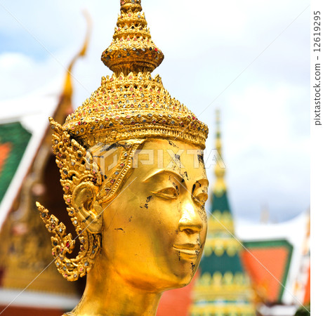 Golden kinnara statue in Grand palace Bangkok,Thailand. Golden kinnara statue in Grand palace Bangkok,Thailand. 12619295