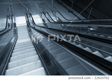 Moving escalator in the business center 12620702