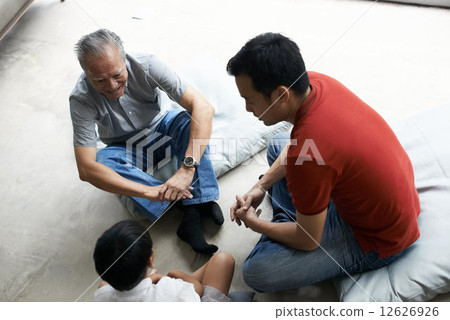 Three Generations of Men - Sitting on Floor Three Generations of Men - Sitting on Floor 12626926