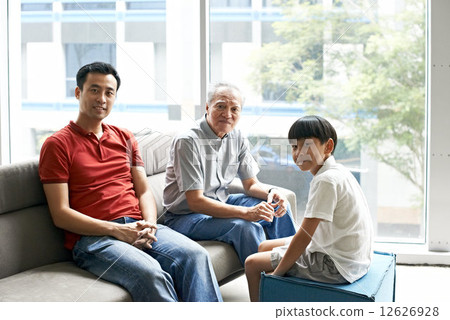 Three Generations of Men - Sitting on Couch 12626928