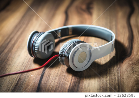 headphones on wooden table 12628593
