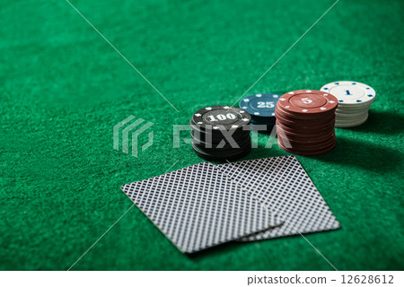 cards on the green poker table cards on the green poker table 12628612
