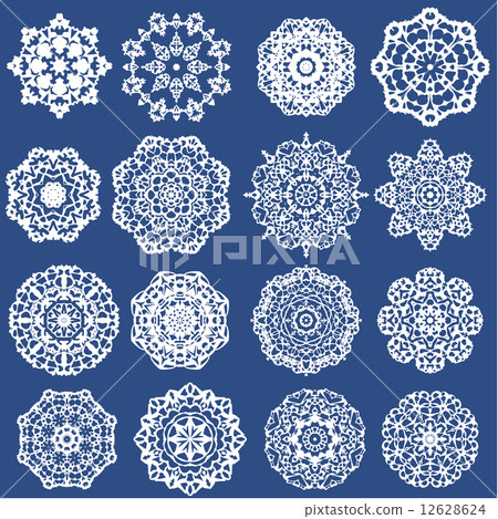 Set of Decorative paper snowflakes. White on blue background Set of Decorative paper snowflakes. White on blue background 12628624
