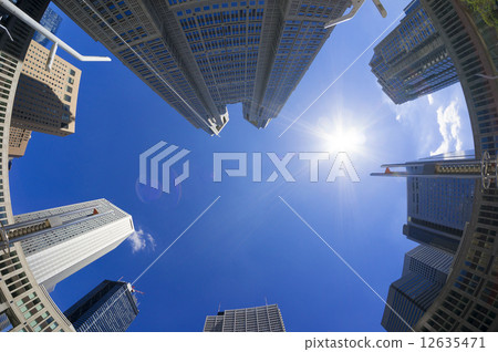 Sunny sky and sun Tokyo Metropolitan Government Office and Shinjuku High-rise Building Fisheye looking up town 12635471