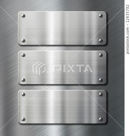 three stainless steel metal plates on brushed background three stainless steel metal plates on brushed background 12635782