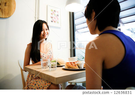 Cafe with two girls Cafe with two girls 12636831