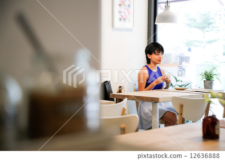 Cafe with two girls Cafe with two girls 12636888