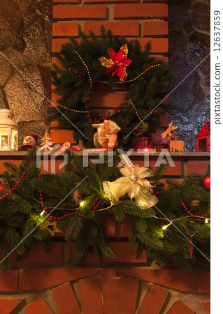 Christmas decorated fireplace Christmas decorated fireplace 12637859