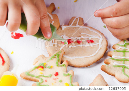 Draw on gingerbread cookies Draw on gingerbread cookies 12637905