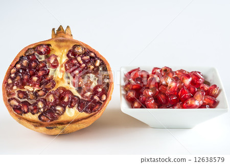 Pomegranate seeds and half fruit 12638579