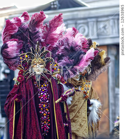 Traditionally dressed Venice carnival person on San marco's squa 12638965