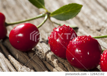 Cherries on a wooden Table 12642182