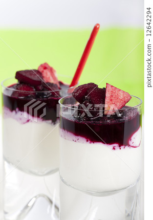 Yogurt and cottage cheese dessert garnished with fruits 12642294