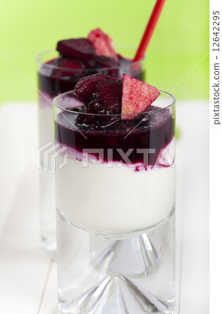 Yogurt and cottage cheese dessert garnished with fruits 12642295