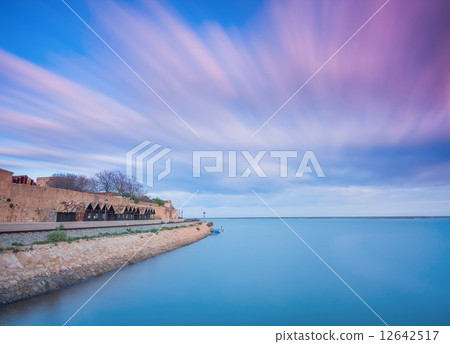 Landscape of the old town of Faro in Portugal. With moving sky. Landscape of the old town of Faro in Portugal. With moving sky. 12642517