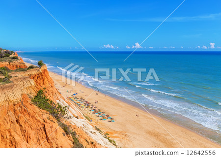 Sunny beach summer sea Albufeira in Portugal. For holiday enjoyment. 12642556