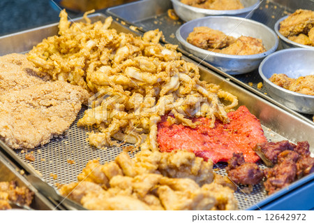 Fried chicken and squid at traditional market in Taiwan Fried chicken and squid at traditional market in Taiwan 12642972