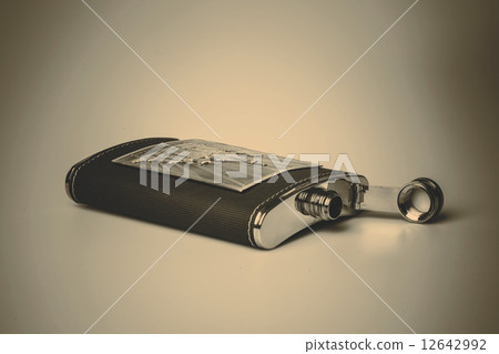 Stainless hip flask isolated on white background 12642992