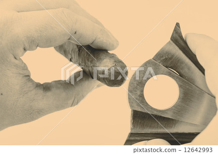 Cigar and cutter on a white background Cigar and cutter on a white background 12642993