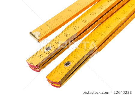 Folding ruler isolated Folding ruler isolated 12643228
