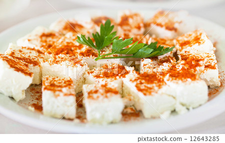 Original bulgarian cheese into plate with parsley and red hot pe Original bulgarian cheese into plate with parsley and red hot pe 12643285