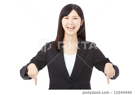 Pointing business woman 12644940
