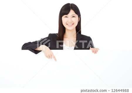 指向留言簿的女商人 12644988