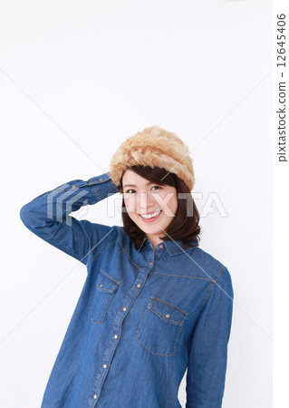 A woman wearing a knit cap A woman wearing a knit cap 12645406