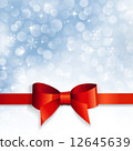 red bow on a background snowflakes 12645639