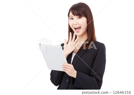 Bizarre business woman holding a tablet 12646158