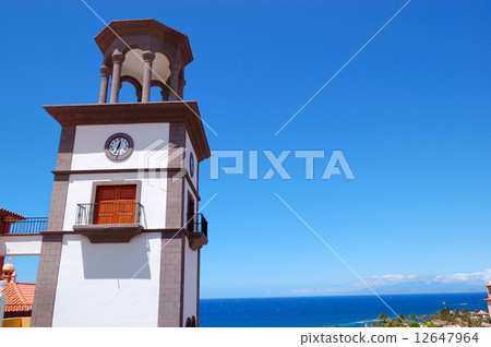 Tower with clock at the luxury hotel, Tenerife island, Spain Tower with clock at the luxury hotel, Tenerife island, Spain 12647964