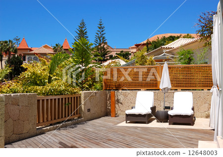 Sunbeds at the outdoor of luxury villa, Tenerife island, Spain 12648003