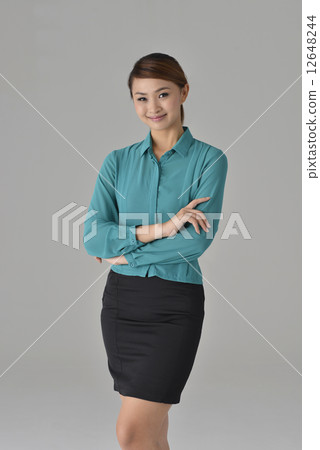 an confident asian office lady smiling an confident asian office lady smiling 12648244