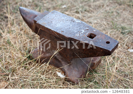 old blacksmith anvil standing on the ground old blacksmith anvil standing on the ground 12648381